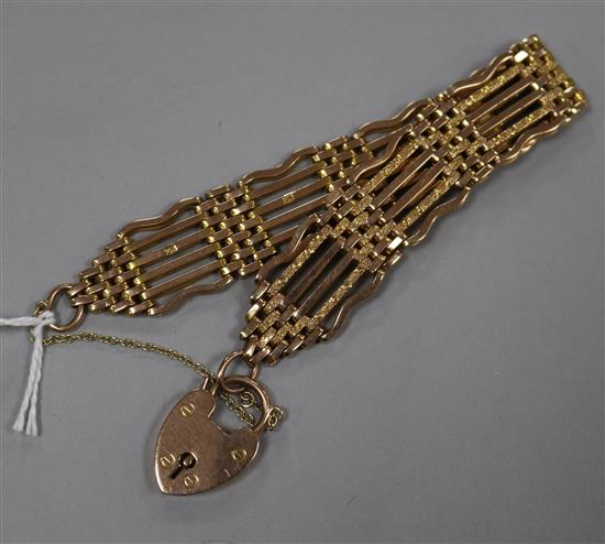 A 9ct gold gate-link bracelet with padlock clasp.